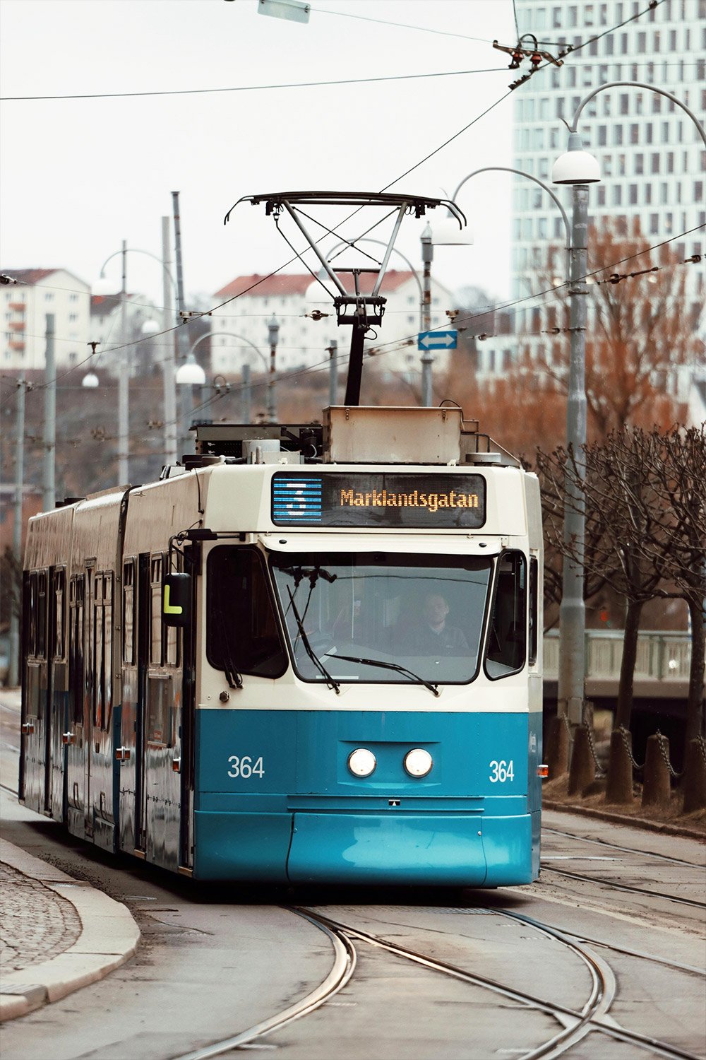 Gothenburg blue trams on Mariakandsgatan street Sweden public transport system