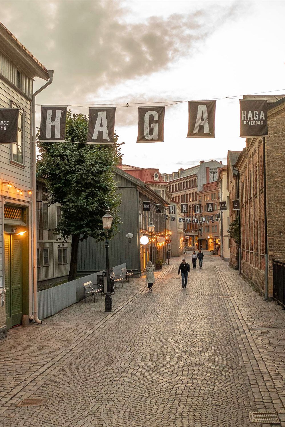 Haga Nygata cobblestone street in Gothenburg lined with historic wooden houses and shops