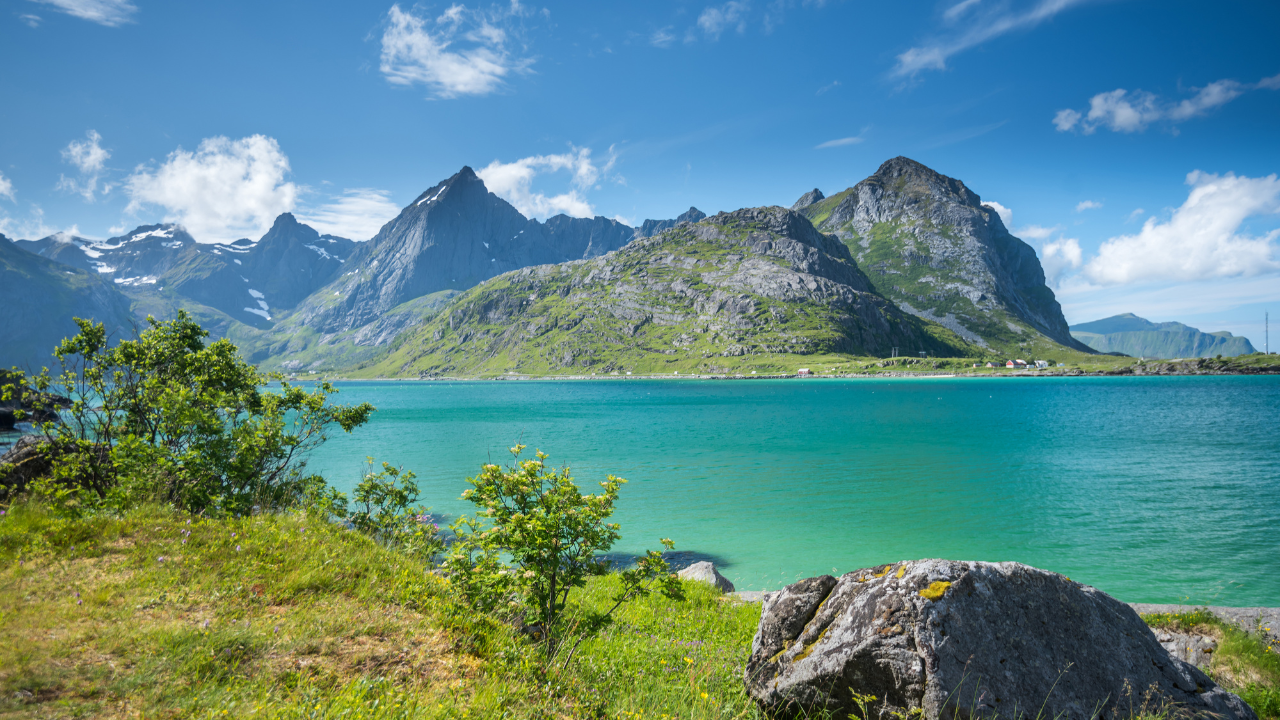 Jagged coastal peaks rising from the sea in Lofotodden National Park, Lofoten Islands, Norway