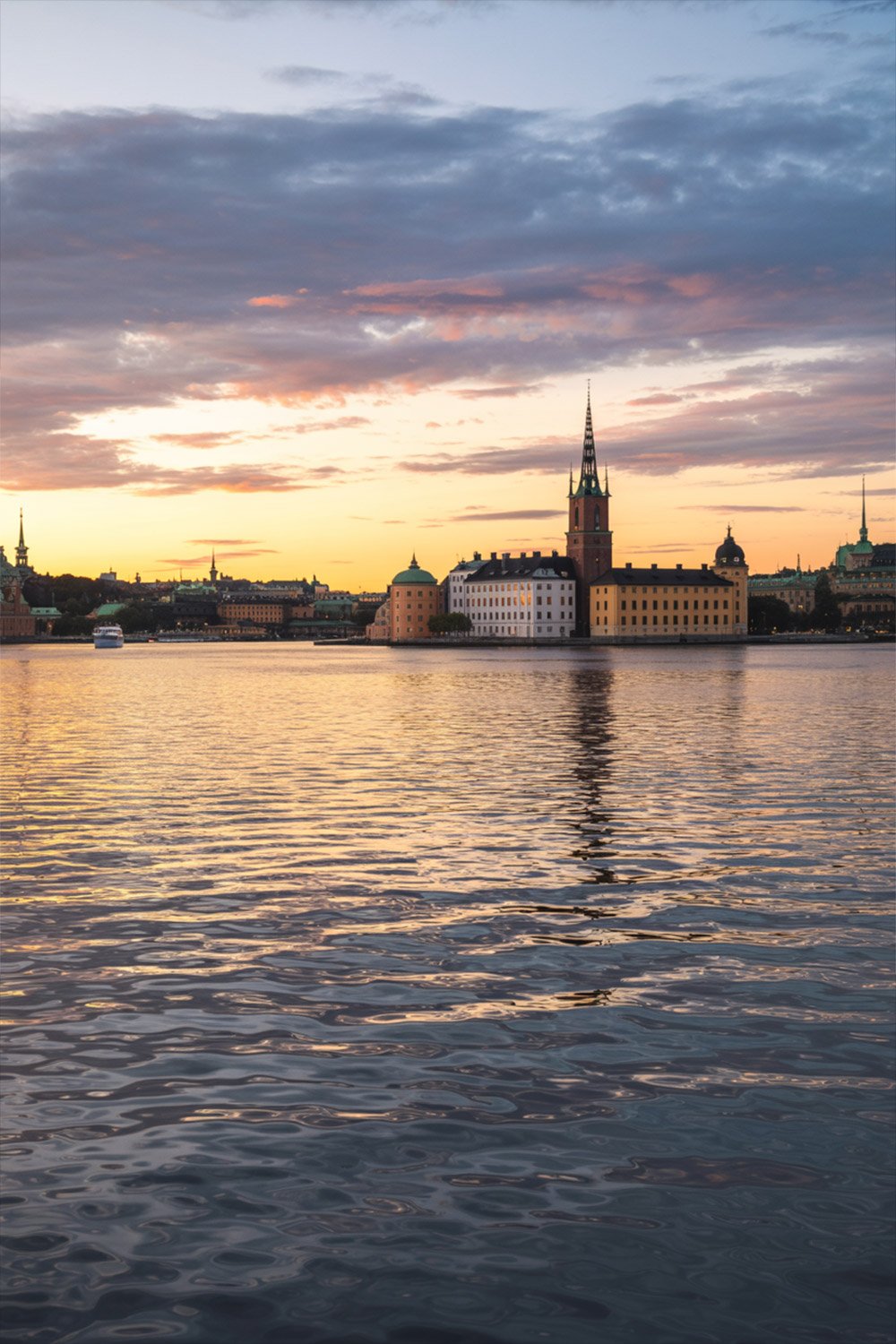 Monteliusvägen sunset view overlooking Stockholm’s skyline and glittering waterfront