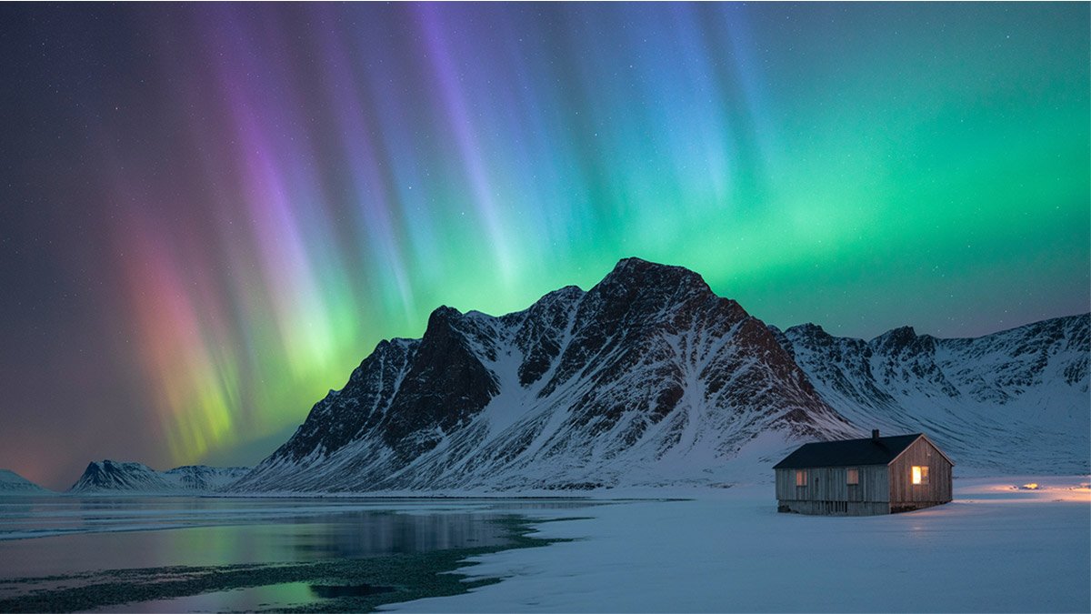 Northern Lights over Svalbard, showcasing the beauty of the polar night in the Arctic region