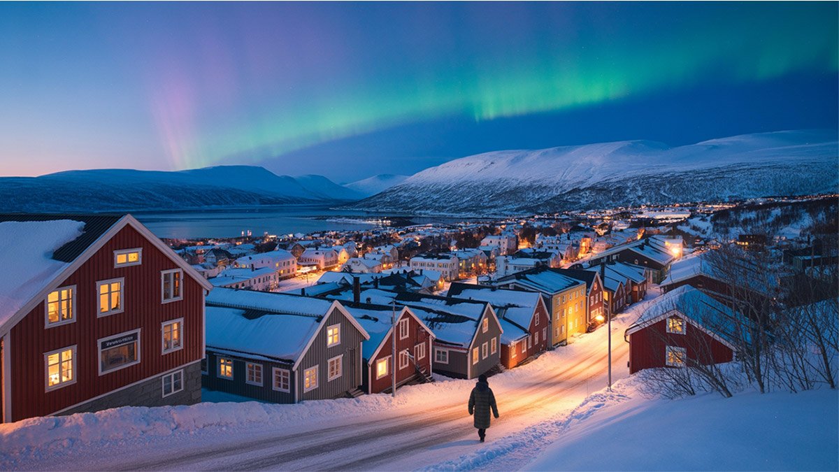 Polar night in Tromsø – Arctic winter skyline under a deep blue twilight sky