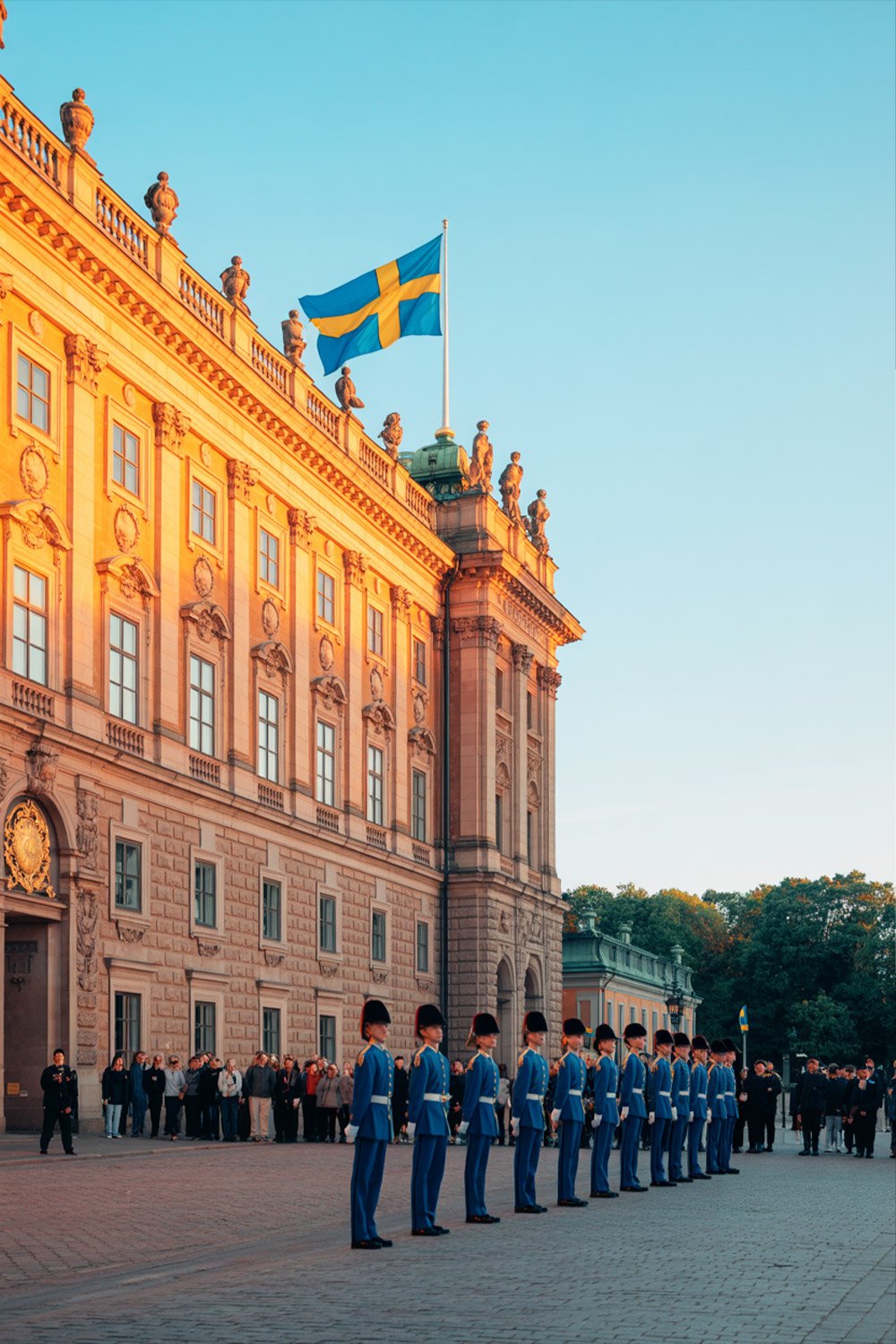 Changing of the Guard at Stockholm Royal Palace with ceremonial uniforms and historic architecture