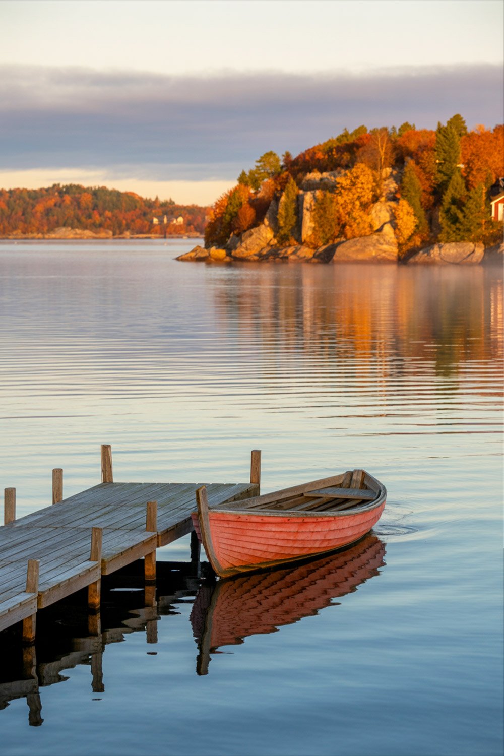 Stockholm archipelago autumn scenery with colorful foliage and calm waters