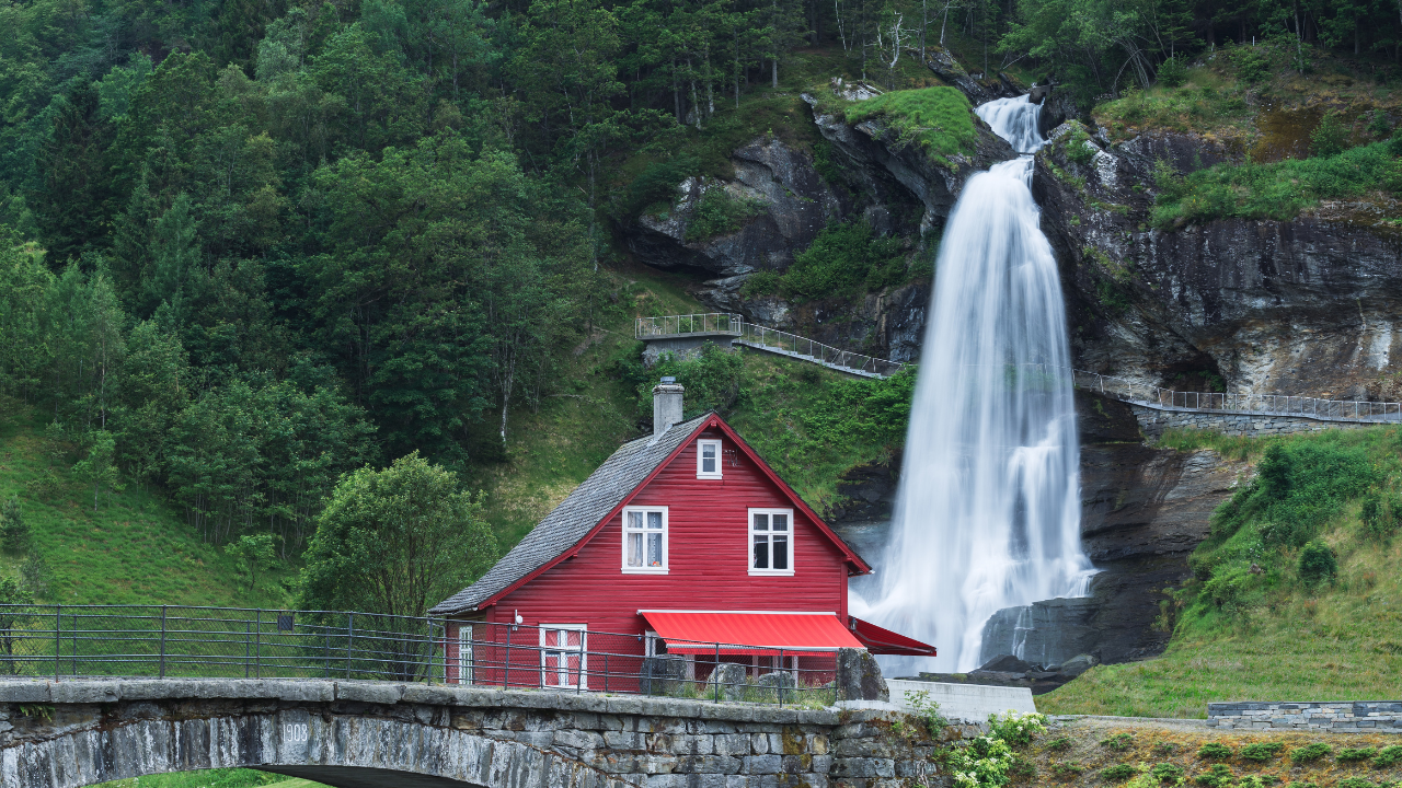 Steinsdalsfossen waterfall with walking path behind the falls near Bergen, Norway