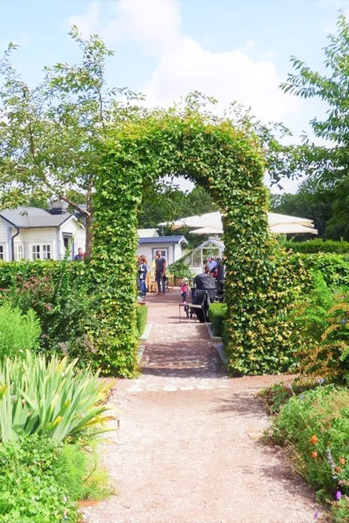 Malmö Castle garden Slottsträdgården Sweden with historic castle backdrop featured in Pathfinders Travel castle guide
