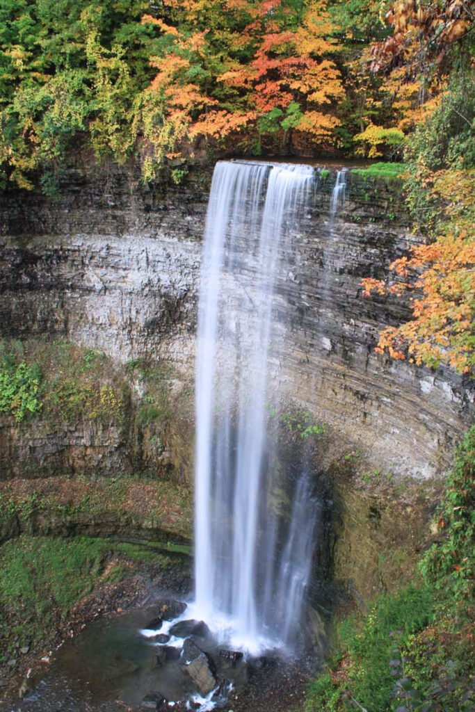 Tews Falls Hamilton Ontario waterfall cascading 134 feet into a forested gorge, featured in Pathfinders Travel Ontario city guide