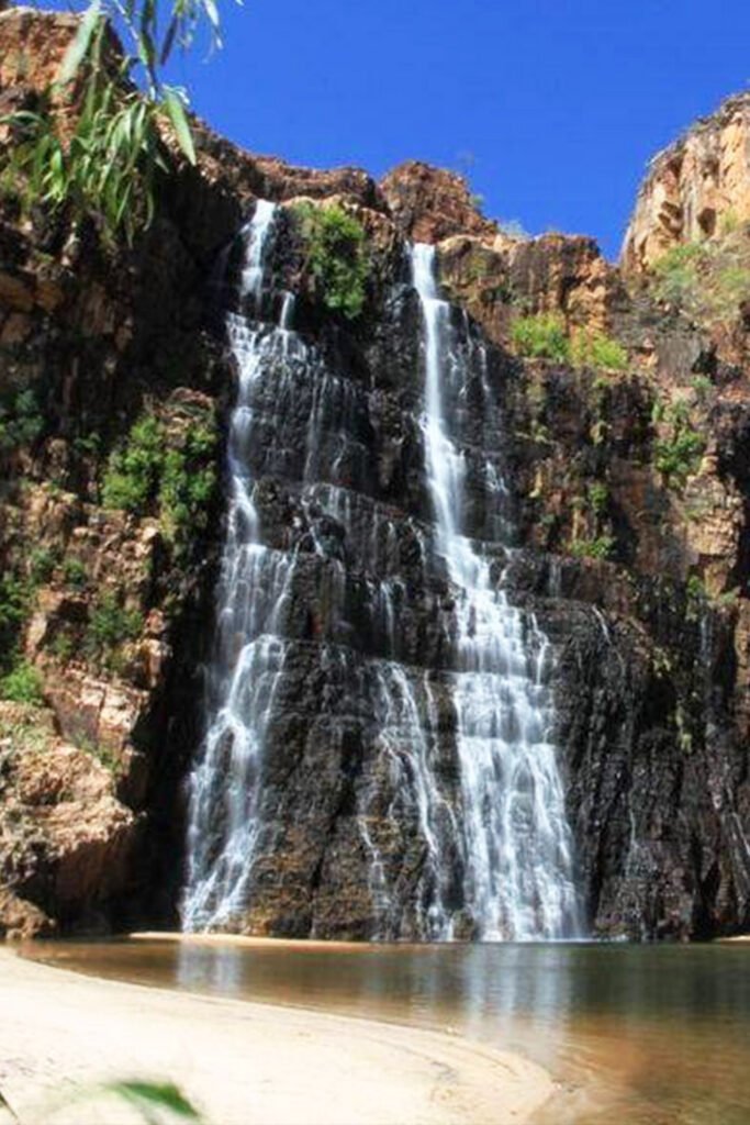 Twin Falls cascading into tranquil pools within a sandstone gorge in Kakadu National Park, Australia