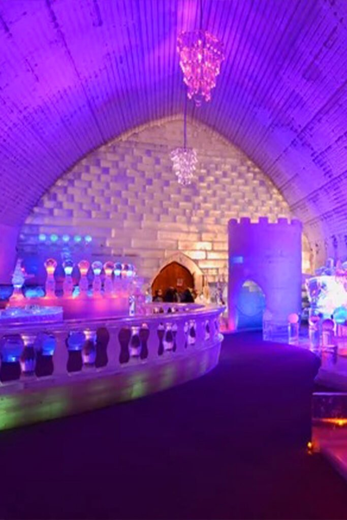 Ice Museum at Chena Hot Springs Resort Alaska, featuring illuminated ice sculptures and crystal-clear frozen interiors captured for the Fairbanks northern lights travel guide by Pathfinders Travel.