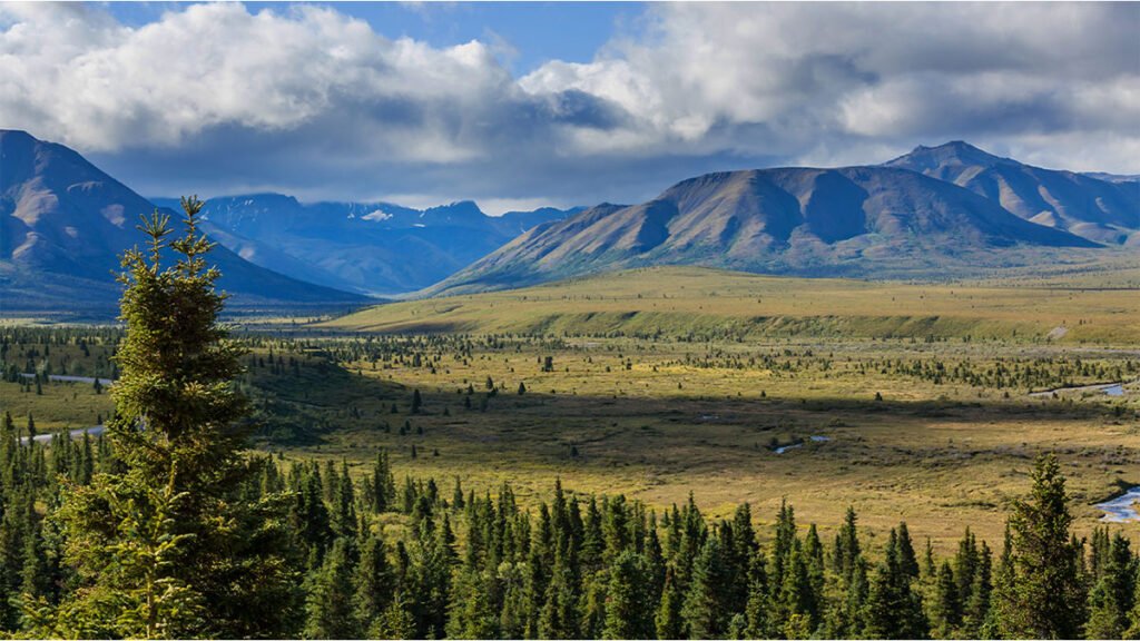 Picturesque mountains of Alaska with glaciers and rocky peaks in summer – Alaska Travel Guide by Pathfinders Travel
