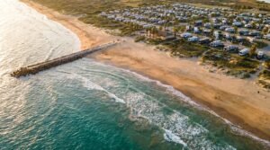 Aerial view of Isla Blanca Park beach and turquoise Gulf waters on South Padre Island Texas