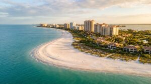 Aerial view of Marco Island pristine beach and turquoise Gulf of Mexico waters at sunset