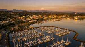 Bellingham Bay waterfront with Mount Baker and downtown skyline at golden hour