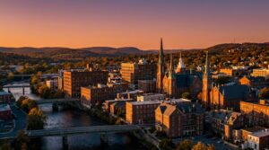 Downtown Reading Pennsylvania historic skyline at sunset with rolling hills