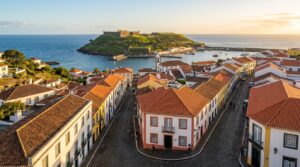 Colorful historic buildings and fortress overlooking Angra do Heroísmo bay in Terceira, Azores