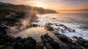 Ponta da Ferraria volcanic hot springs meeting Atlantic Ocean at sunset in São Miguel Azores