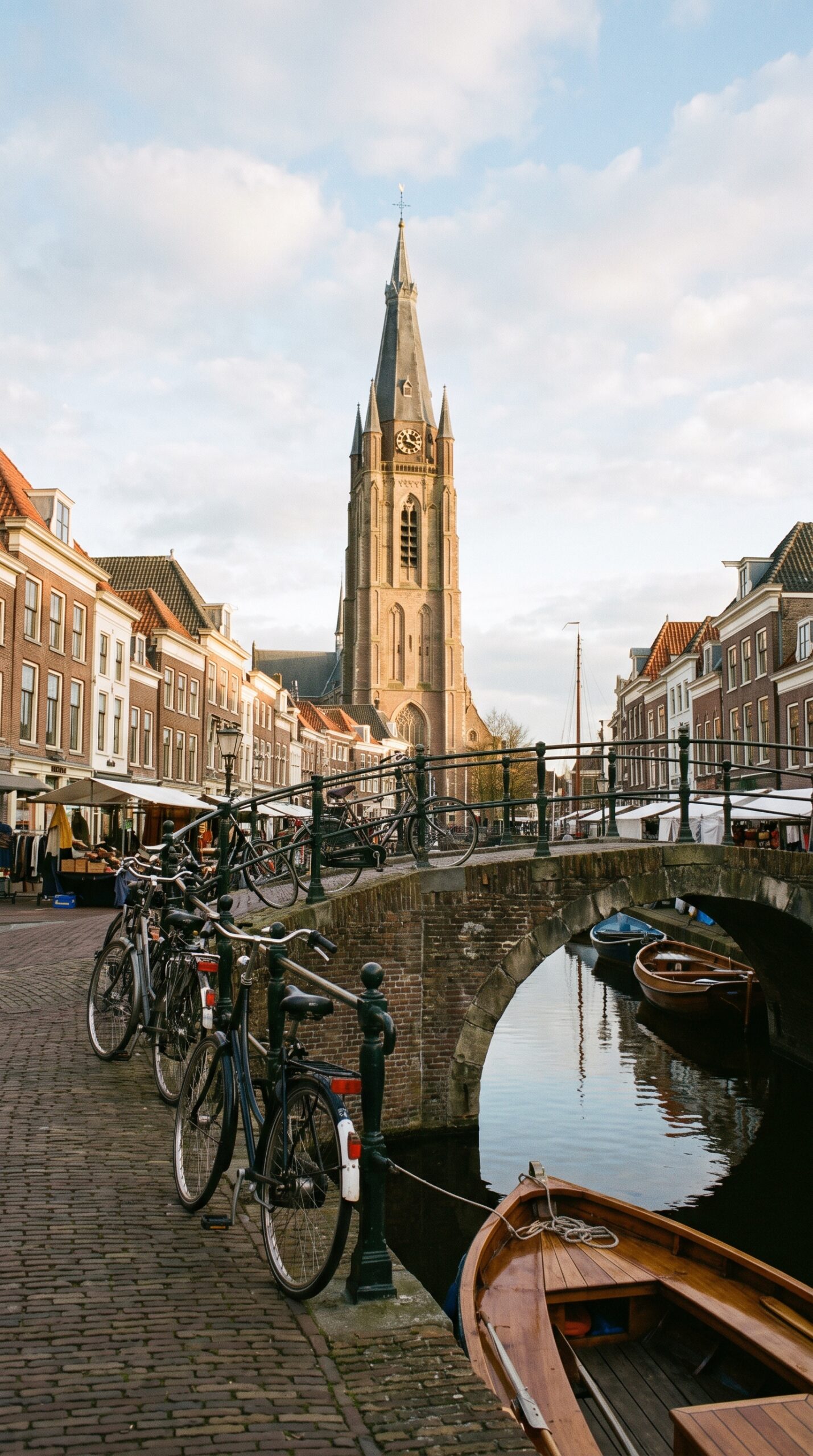 Delft canal and church tower, an easy day trip from The Hague